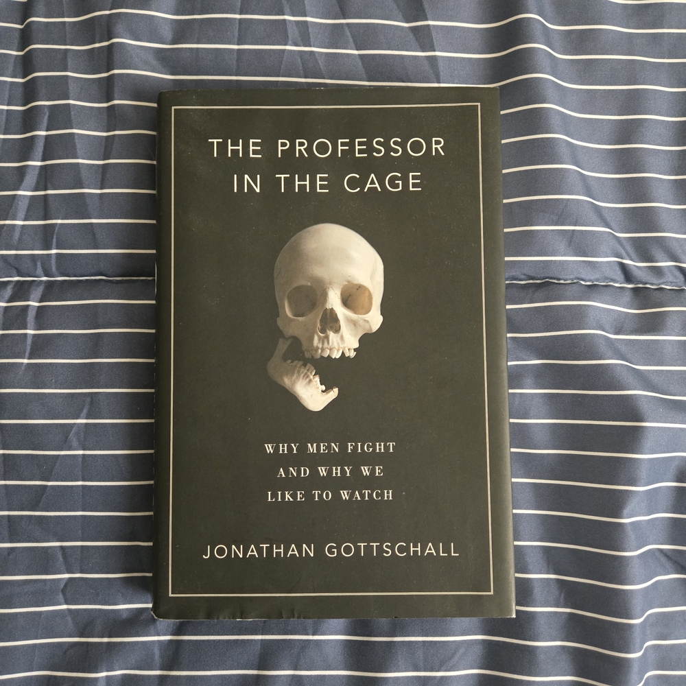 The Professor in the Cage Book - Black Cover